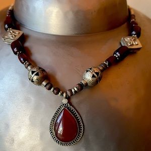 Heirloom Tibetan necklace w/ large teardrop garnet center silver & garnet beads.